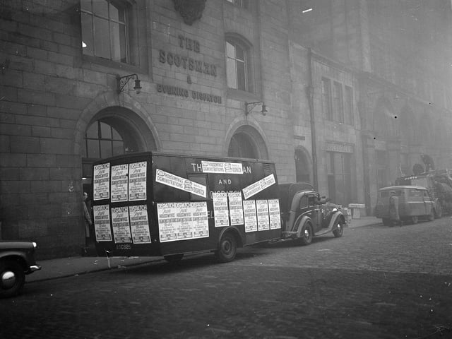 The Evening News delivery van, plastered with posters advertising Housewives Demonstrations, outside the newspaper offices in September 1959.