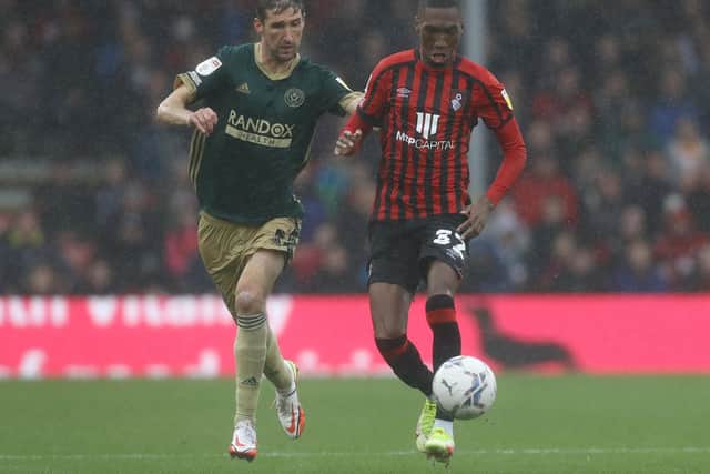 Chris Basham of Sheffield United tackles Jaidon Anthony of Bournemouth:  Paul Terry / Sportimage