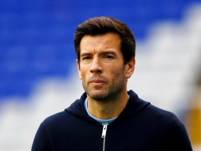 Career win percentage: 36.8%. Number of games at current club: 57.