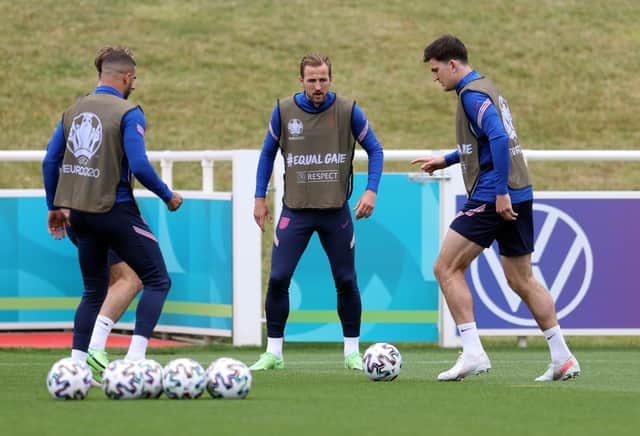 Harry Kane and Harry Maguire of England during an England training session at St George's Park on June 17, 2021 in Burton upon Trent, England. (Photo by Catherine Ivill/Getty Images)