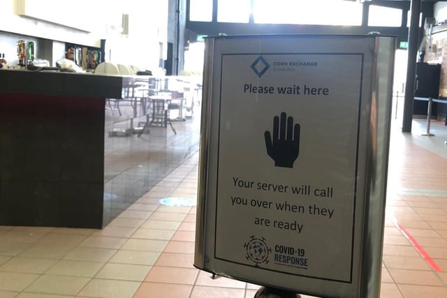 A server will call customers over once they are ready