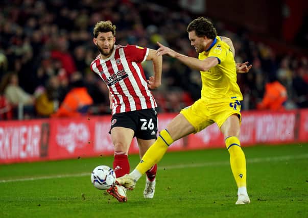 Sheffield United's Charlie Goode and Blackburn Rovers' Sam Gallagher (right) battle for the ball: Mike Egerton/PA Wire.