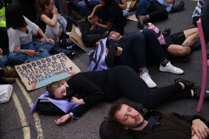 Protesters lay down in the street as part of the 'Impossible Rebellion' protests (Photo by Dan Kitwood/Getty Images)