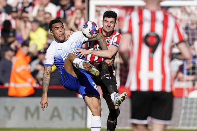 Sheffield United's John Egan in action against Wigan Athletic: Andrew Yates / Sportimage