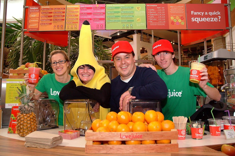 Lovejuice opened in Meadowhall Oasis Food Hall in 2006.  John Heseltine, founder of Lovejuice, cutting a ribbon to officially open his latest store with his two Sheffield staff, Melanie Dydhe manager and Daniel Differ, trainee supervisor.