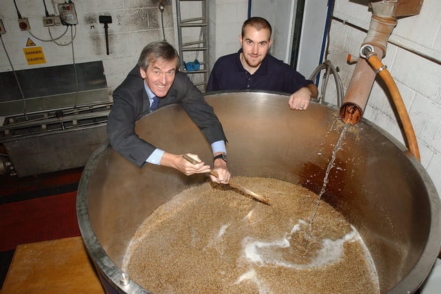 Sheffield University Vice Chancellor Robert Boucher left and Assistant Brewer Stuart Ross got to grips wth the University's Centenary beer being brewed at the Kelham Island Brewery in 2004