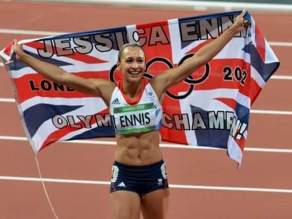 Jess Ennis celebrating her heptathlon gold medal win at the 2012 Olympics in London, a feat that rocketed her status to household name and sporting icon