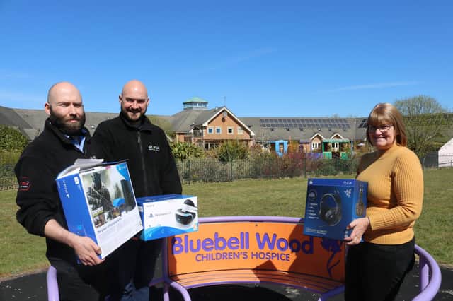 (Left to Right) Liam Hulme and Billy Hawes, Global Windows Joint Managing Directors, and Sally Baker, Bluebell Wood Regional Fundraiser
