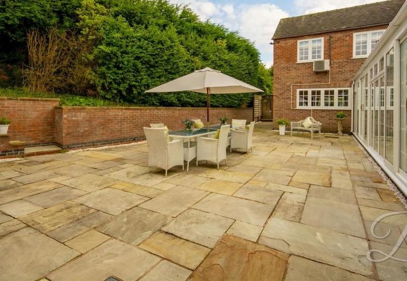 An attractive patio area is one of the highlights of the outside space. Imagine spending pleasant summer's evenings here.
