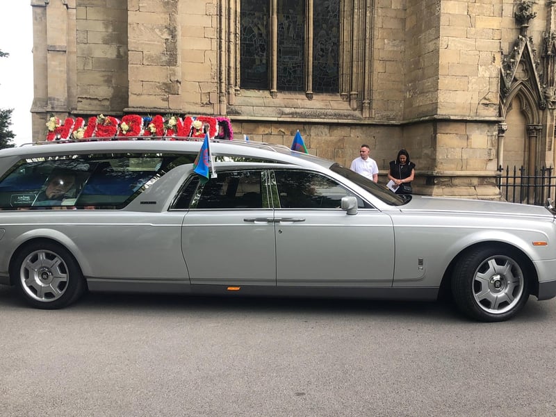 Mr Taylor arrives at the minster