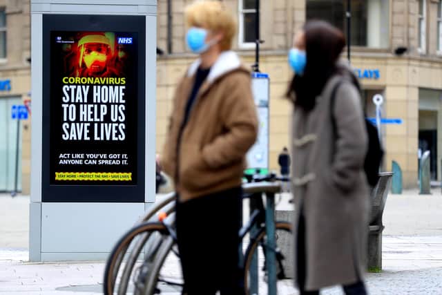 Electronic bilboards displays a message warning people to stay home in Sheffield - Mike Egerton/PA Wire