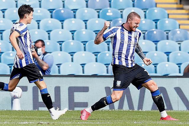 Sheffield Wednesday forward Connor Wickham celebrates his late, late equaliser as Sheffield Wednesday emerged with a point they deserved.