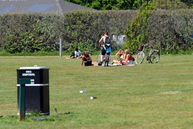People were socially distancing on Southsea Common on Thursday, May 21 - the hottest day of the year. Picture: Sarah Standing (210520-2448)