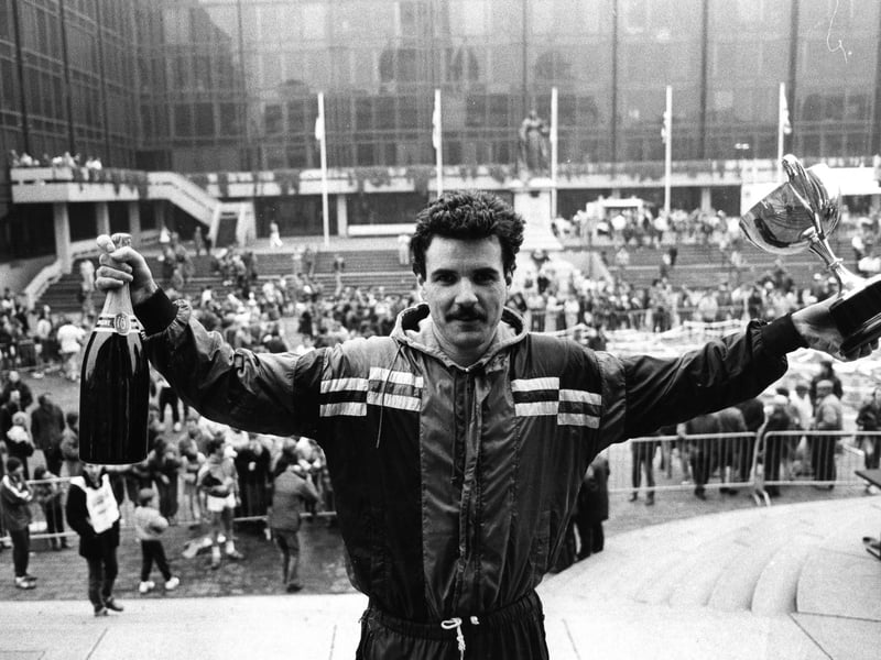 Kevin Jaques celebrating his win at the Portsmouth half marathon, 1987. The News PP4941