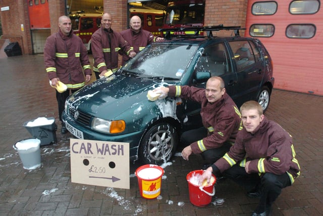 Pictured at the  Sheffield Central Fire Station, Wellington Street, where the Fire Service National Benevolent Fund held a charity car wash in 2005. Seen are some of the fire fighters getting down to the job.