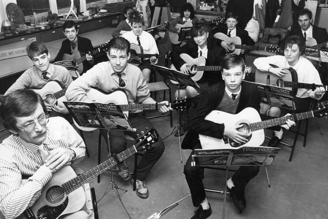 Pupils from St Wilfrid's Comprehensive School in a guitar learning session in 1988 with teacher Bill Waugh, front.