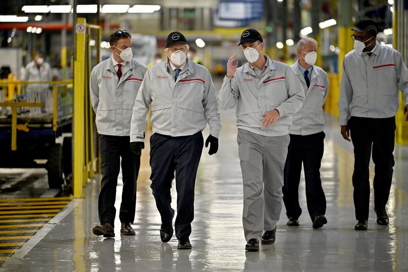 The Prime Minister takes a walk through the plant. Picture: Jeff J Mitchell/Getty Images.