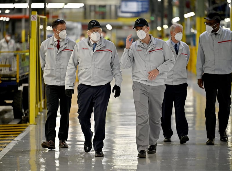 The Prime Minister takes a walk through the plant. Picture: Jeff J Mitchell/Getty Images.