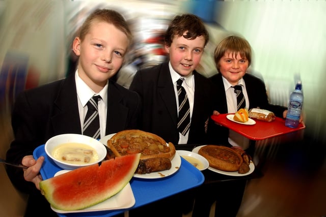 The Armthorpe School pupils, from left, Steven Benton, Cameron Farrell and Joseph Monks, all aged 12, with their school meals in 2005