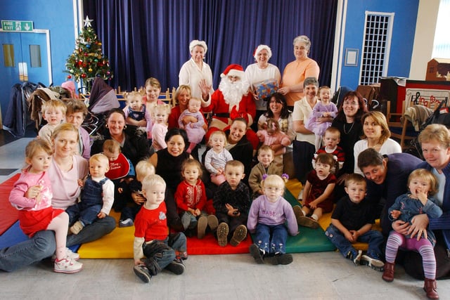 Parents and toddlers from St Margaret's had a visit from Santa at their 2003 Christmas party. Were you there?