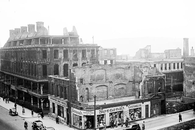 Walsh's Department store and other buildings on High Street damaged by the blitz in Sheffield