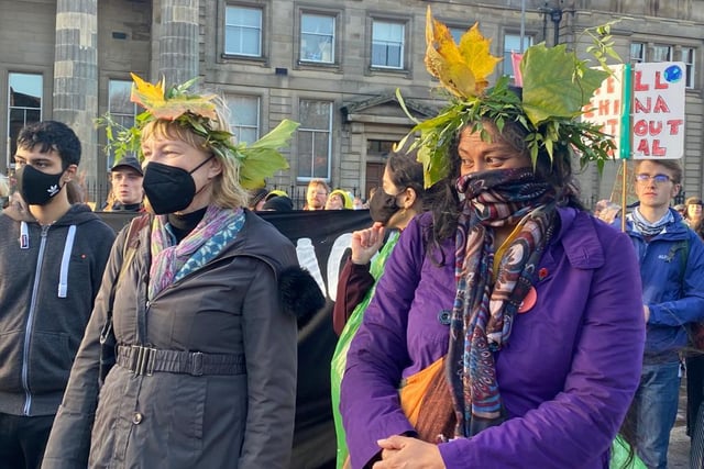 Activists out on Saturday wearing head pieces created with real leaves.