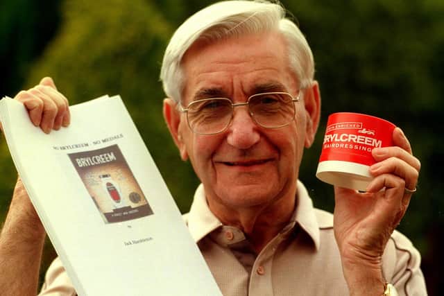 Jack Hambleton with one of his manuscripts (and a tub of Brylcreem) in 1990