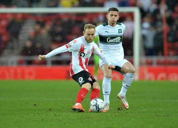 Alex Pritchard in action at the Stadium of Light.