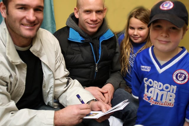 Chesterfield FC footballers Kevin Gray and Derek Niven signed autographs for Stan and Poppy Tomkinson when they visited Chesterfield Royal Hospital's Nightingale Ward in 2007.
