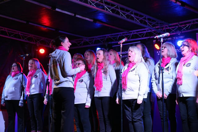 FVC Choir performing at the Christmas lights switch on in Palmerston Road, Southsea. Picture: Chris Moorhouse (251121-29).