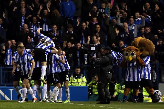 Players celebrate after Kieran Lee of Sheffield Wednesday scored during the Sky Bet Championship Play Off First Leg between Sheffield Wednesday and Brighton & Hove Albion at Hillsborough on May 13, 2016 in Sheffield, England.  (Photo by Nigel Roddis/Getty Images)
