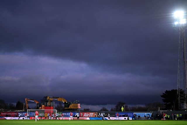 A general view of play in the English FA Cup fourth round football match between Wrexham and Sheffield United at the Racecourse Ground Stadium in Wrexham: OLI SCARFF/AFP via Getty Images