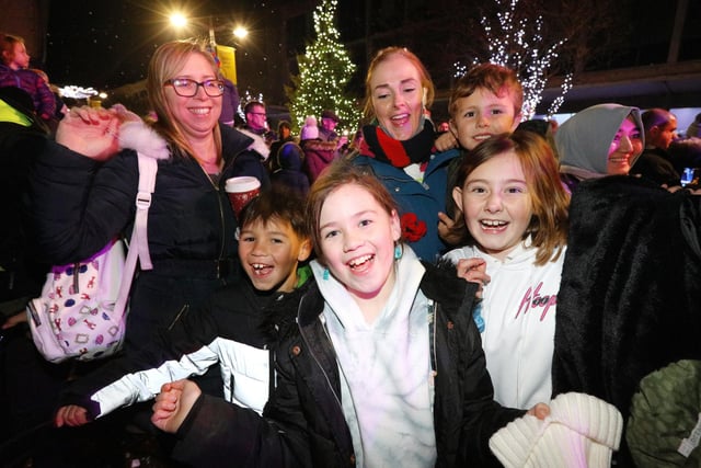 Happy families at the Christmas lights switch on in Palmerston Road, Southsea. Picture: Chris Moorhouse (251121-55).