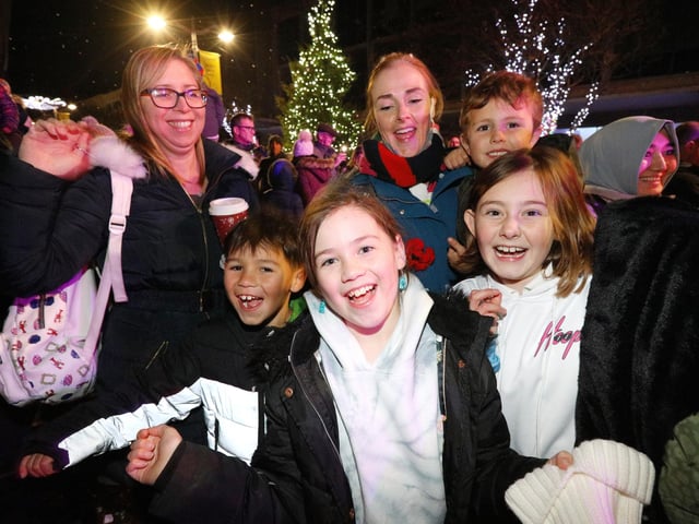 Happy families at the Christmas lights switch on in Palmerston Road, Southsea. Picture: Chris Moorhouse (251121-55).