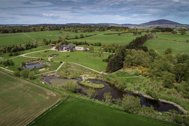 Incorporating Swiss design and ingenuity, Boulder House is a unique home designed to the very highest of standards, set amidst 11 acres. Offers over £1,900,000.