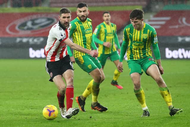 Chris Basham is set to miss Sheffield United's game against Brighton and Hove Albion: Simon Bellis/Sportimage