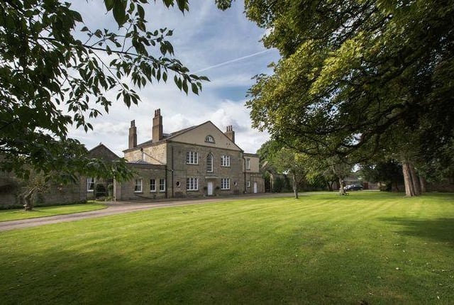 This eight bedroom country house has a games room, breakfast room and a swimming pool in a summer house.