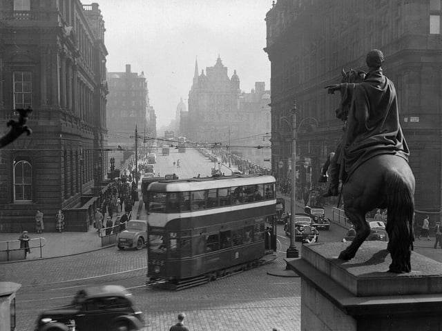 Tram turning from North Bridge at the east end of Princes Street, 1950s.