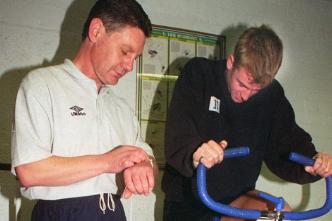 Doncaster Rovers Physio puts Phil McLoughlin through his paces at the gym in 1996.