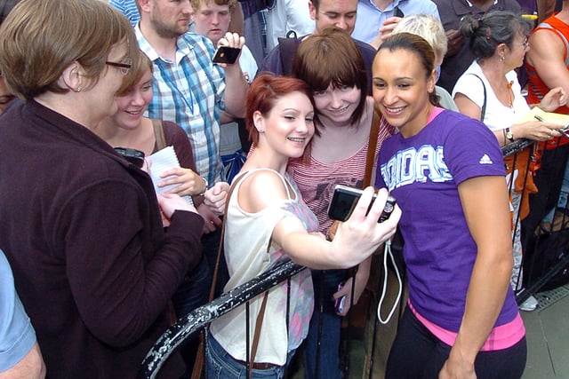 Jessica Ennis posing for a picture with fans at the send-off event