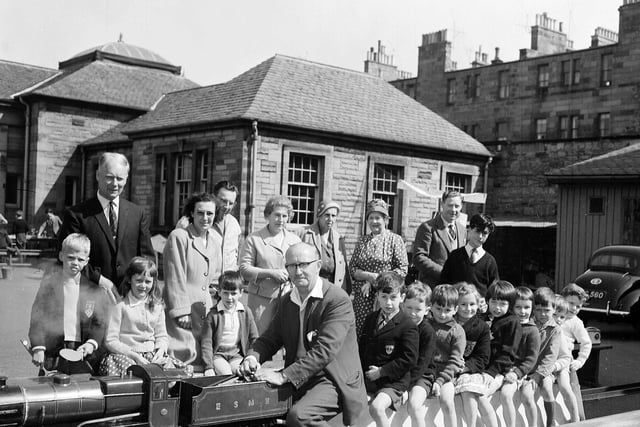 Children on a train trip, driven by Mr A Drummond, at the Stockbridge Carnival in May 1963.