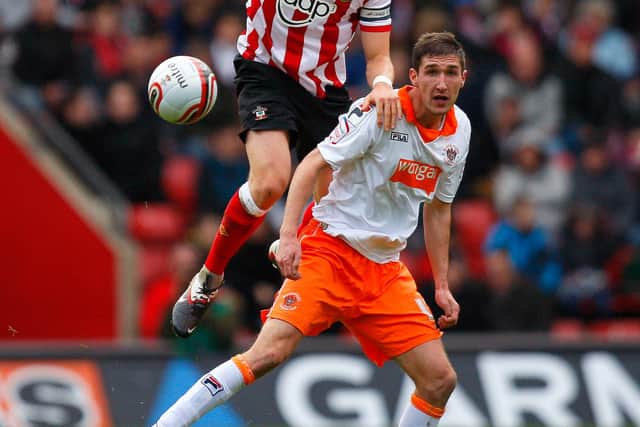 A younger Hammond up against Blackpool's Chris Basham in his Southampton days: Jake Badger/Sportimage