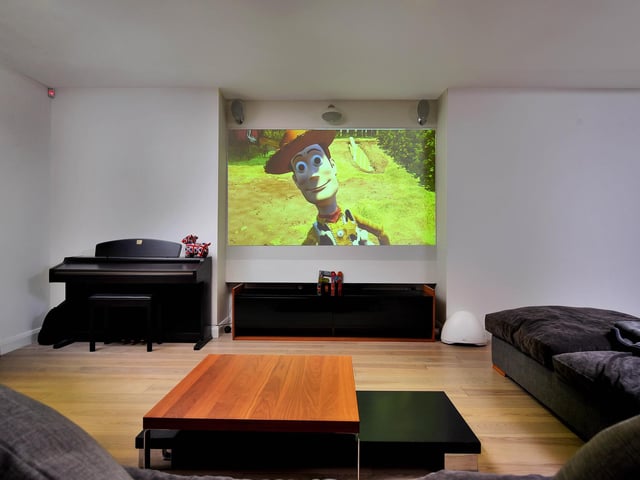 The lower ground/ basement level offers an independent shower room and further reception room currently utilised as a games/ cinema room with French doors leading onto a sunken terrace.