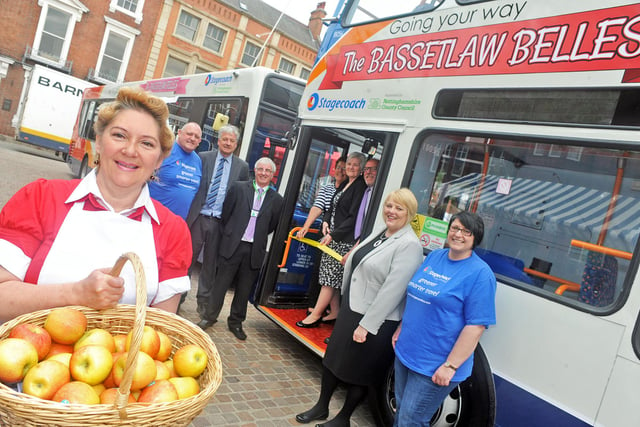 Coun. Pam Skelding cut the ribbon to launch the Bassetlaw Belles bus service in Retford Market Place in 2015