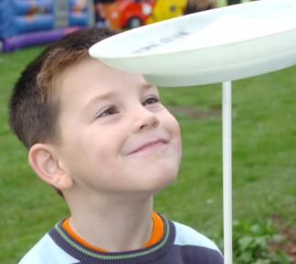 Three year old Koby Bulmer tries plate spinning in October 2007.