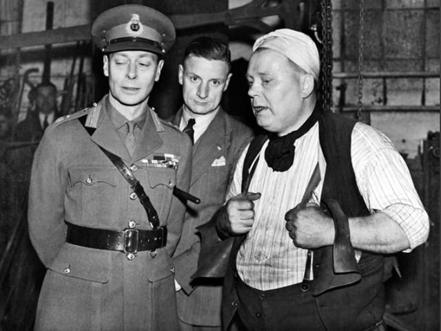 King george VI at Doncaster Plant Works October 1941 with a blacksmith