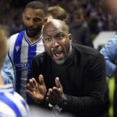 Sheffield Wednesday Manager Darren Moore gathers his players into a huddle before the penalty shoot out   Pic Steve Ellis