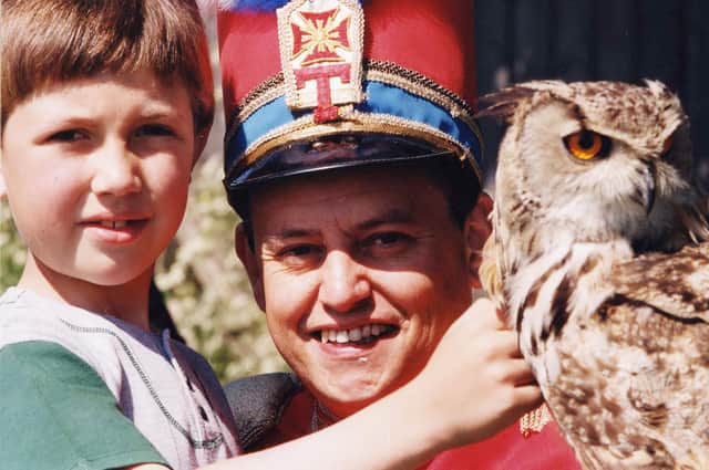 Tommy the Trumpeter and youngster Blake Gustafson are pictured with Bonny Lass, an Eagle Owl from the Northumbria Birds of Prey Centre. Were you there at the Brinkburn Community Association's open day?