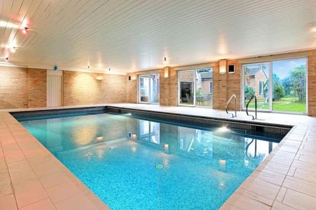 The indoor swimming pool.