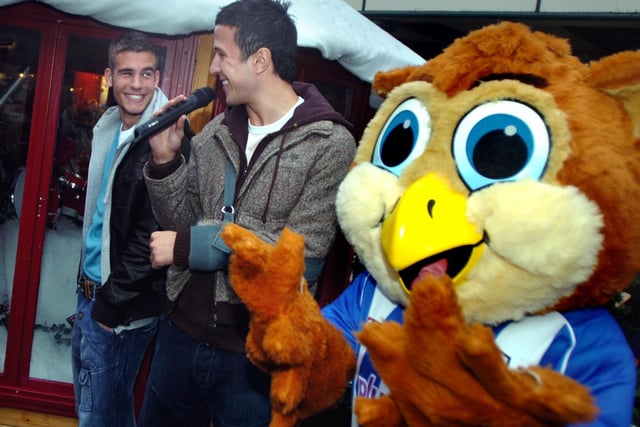 Tommy Spurr and Richard Wood, along with Barney Owl, switch on the Christmas lights in Orchard Square in Sheffield city centre.